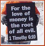Sign from 11 March 09 Thorp Dog Auction protest: For the Love of Money is the Root of all Evil.